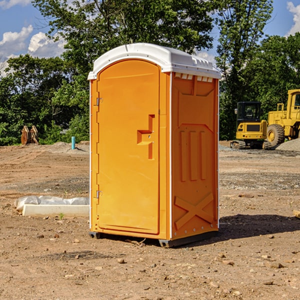 how often are the portable toilets cleaned and serviced during a rental period in Cadillac